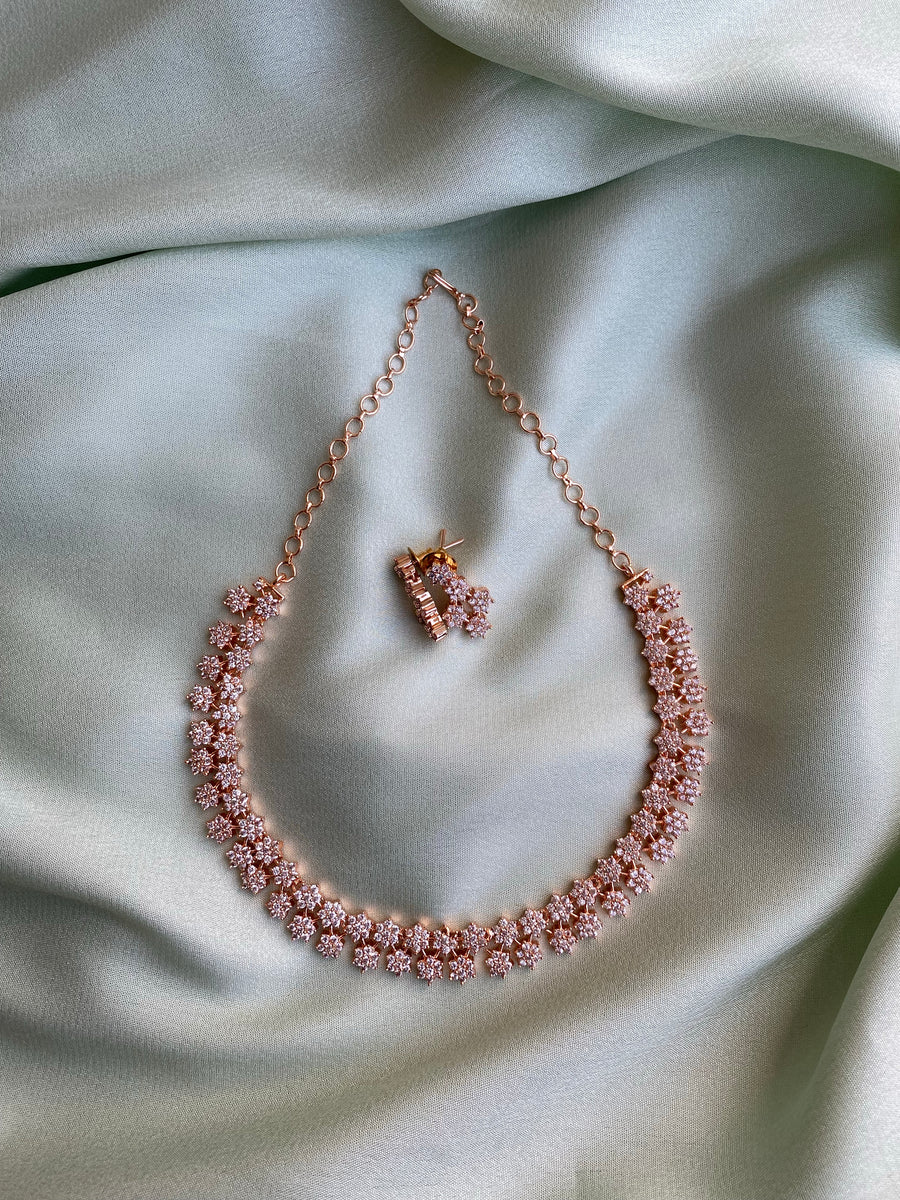 Rose gold star necklace with earrings
