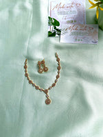 Simple AD Gold finish necklace with earrings