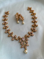 Simple Gold finish leaf necklace with earrings