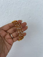 White stone bangles (4 bangles)