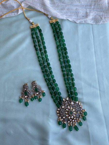 Green beads with Victorian pendant Haram and earrings Daivik.in