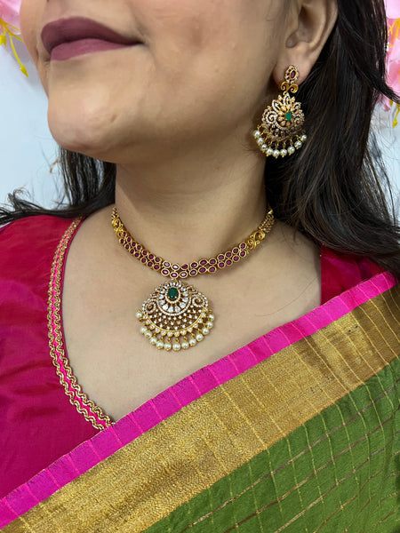 Free Photos - A Beautiful Woman Wearing Traditional Indian Gold Jewelry,  Including A Necklace And Multiple Earrings. She Is Elegantly Dressed In A  Red-colored Sari, Which Accentuates Her Stylish And Vibrant Appearance.